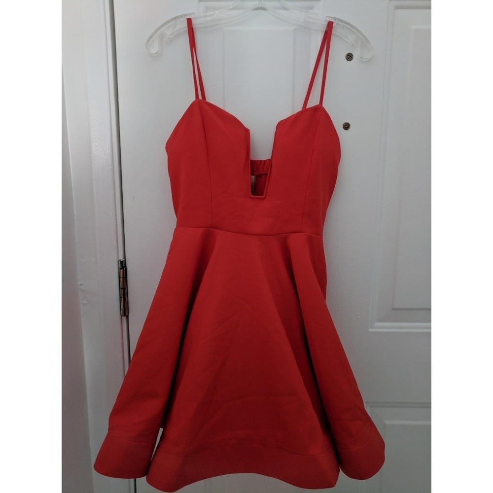Never worn, fun and flirty cocktail dress